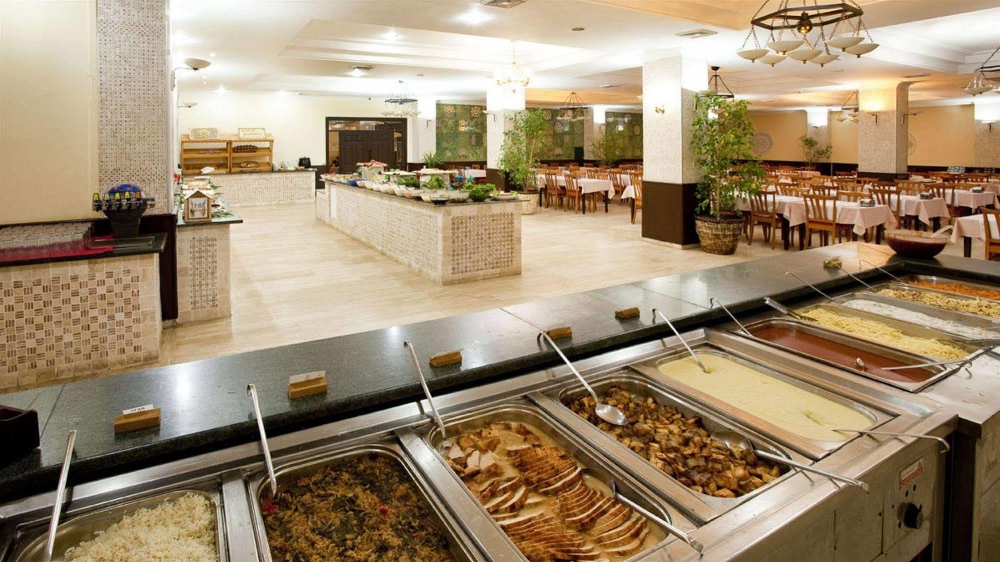 Sural Garden Hotel Side Bagian luar foto